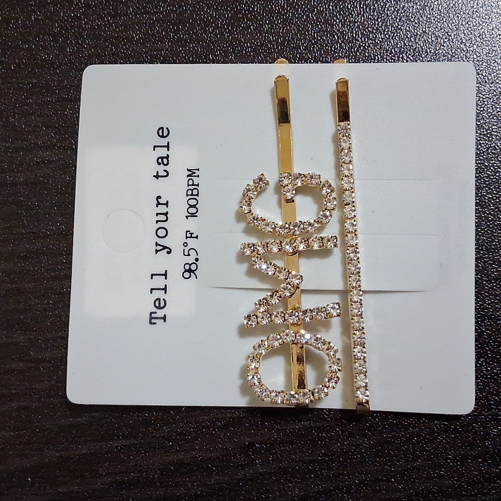 Tell Your Tale Gold Hair Clip Set
